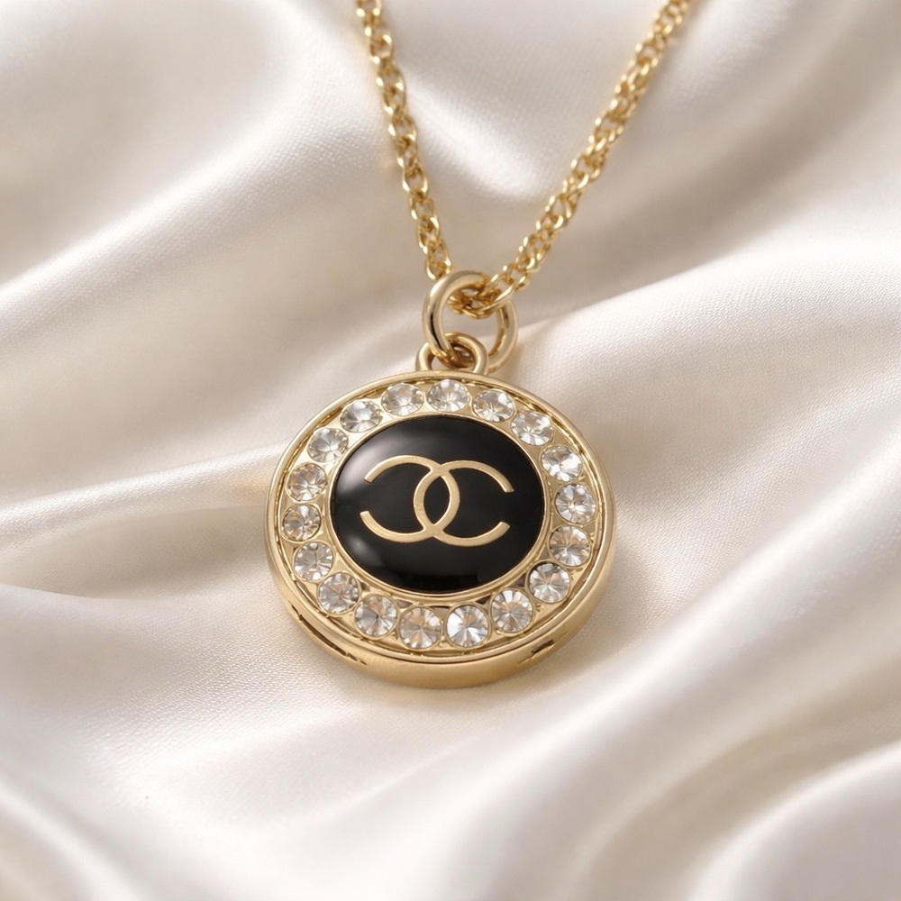 Elegant Chanel Gold and Black Pendant Necklace